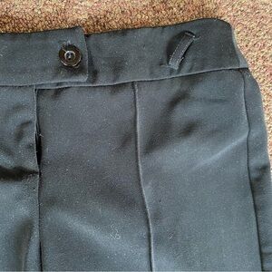 White House, Black market dress pants with loop for decorative sash. True value.